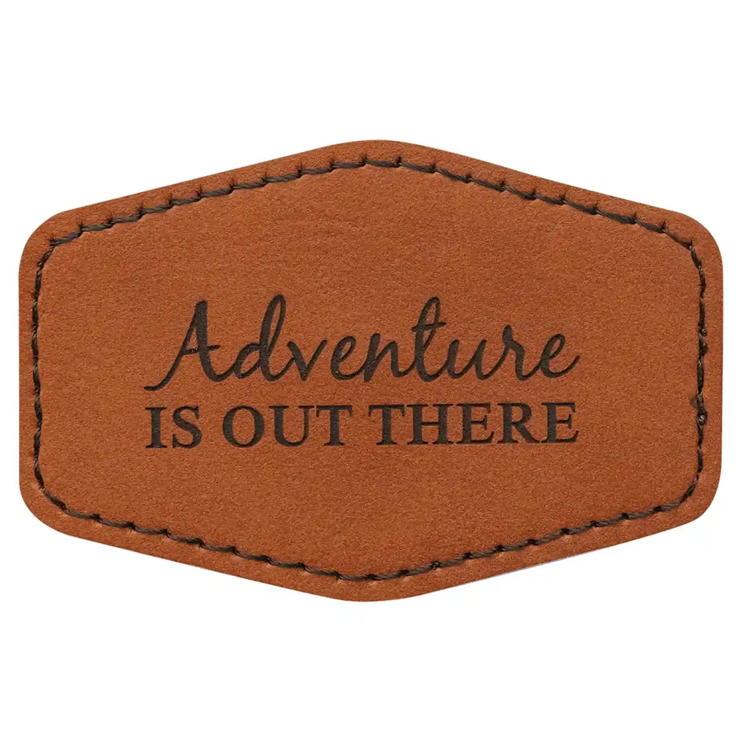 Brown leather patch with 'Adventure is Out There' text on a white background