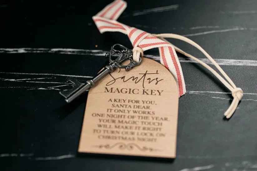 Decorative key with a tag on a dark surface